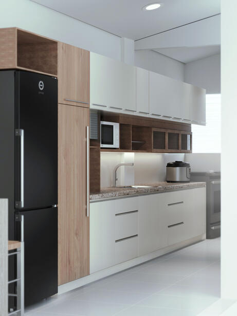 Galley kitchen perspective with ample counter space and a pantry cabinet