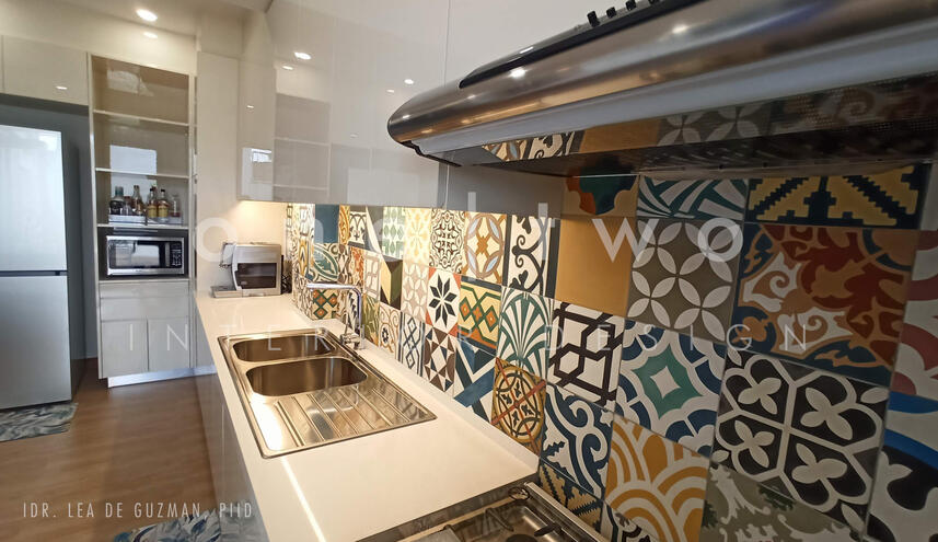 Machuca tiles backsplash behind the sink and stove.