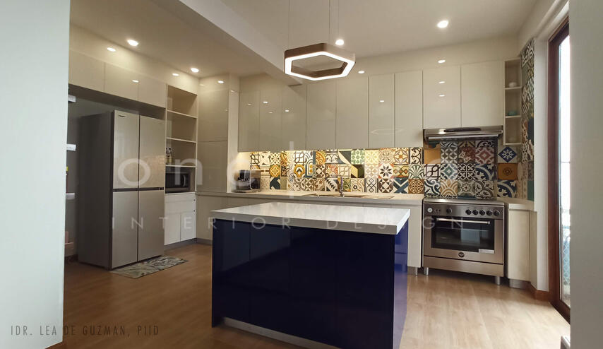 Renovated kitchen with Machuca tile backsplash.